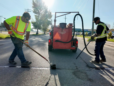 Public Works Filling Cracks and Holes
